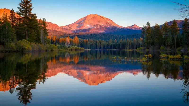 Sunset at Lassen Peak with reflection on Manzanita Lake