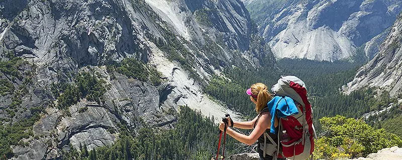Hiker overlooking spectacular mountain vista
