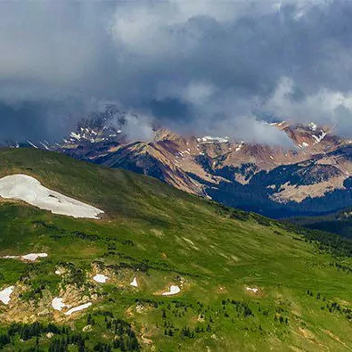 A misty morning covers the mountain tops in Rocky Mountain National Park