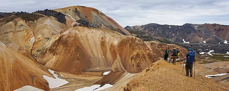 Hikers on dirt trail